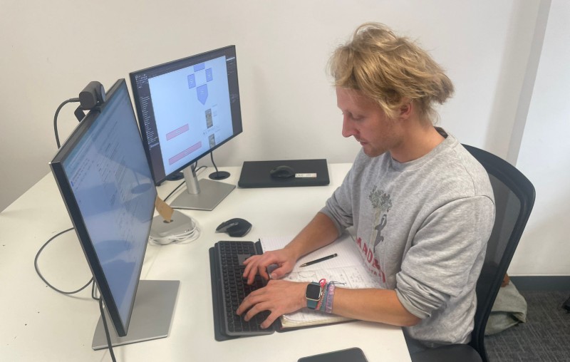 Man working at computer.