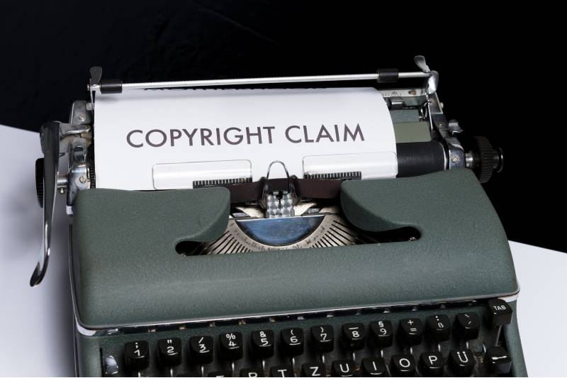 old fashioned typewriter with Copyright Claim on a piece of paper 